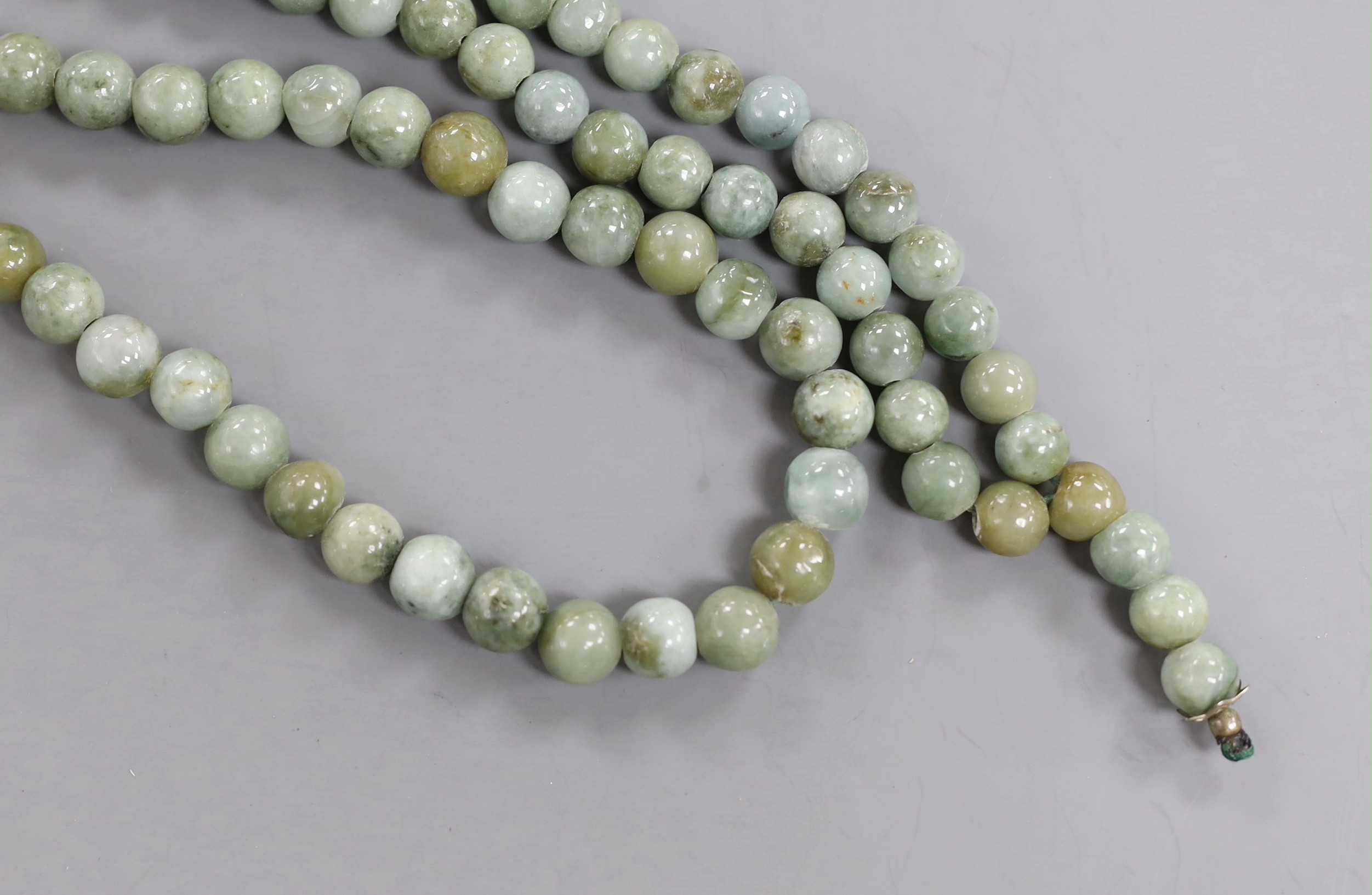 A Chinese jadeite bead necklace, 102cm.